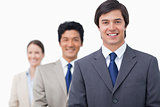 Smiling businesspeople standing in a line