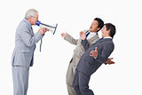 Senior salesman with megaphone yelling at his employees