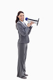 Profile of a businesswoman smiling with a megaphone