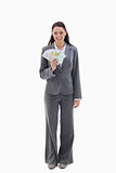 Businesswoman smiling with a lot of bank notes in her hand
