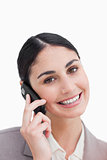 Close up of smiling businesswoman on her cellphone