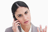 Close up of angry businesswoman on her cellphone