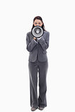 Businesswoman speaking in a megaphone