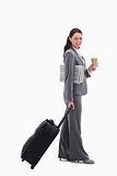 Profile of a businesswoman smiling going for a trip
