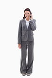 Smiling businesswoman using a phone