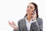 Close up of a businesswoman on the phone explaining 