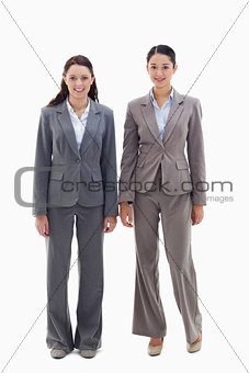 Two businesswomen smiling