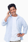 Smiling male on mobile phone