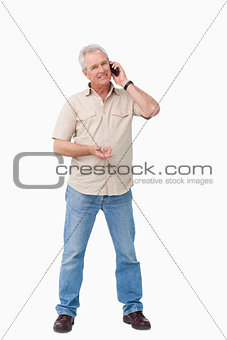 Mature male on his cellphone