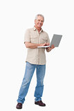 Smiling mature male with his laptop