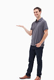 Standing man smiling and presenting