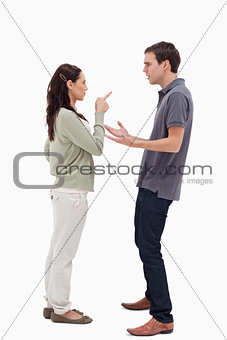 Woman scolding man 