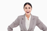 Young businesswoman looking positive surprised
