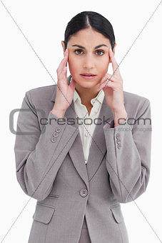 Young saleswoman with headache