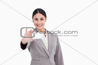 Smiling saleswoman presenting her business card