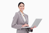 Smiling businesswoman with her laptop