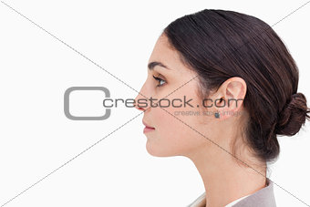 Close up side view of young businesswoman