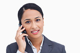 Close up of saleswoman on her cellphone