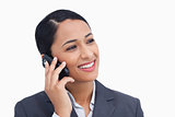 Close up of smiling saleswoman on her cellphone