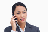 Close up of saleswoman listening to caller