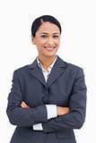 Close up of smiling saleswoman with arms folded