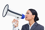 Close up side view of saleswoman using megaphone