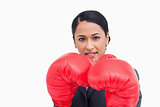 Close up of confident saleswoman with boxing gloves