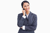 Close up of smiling saleswoman in telephone conversation