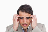 Close up of salesman experiencing a headache