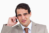 Close up of irritated salesman on his cellphone