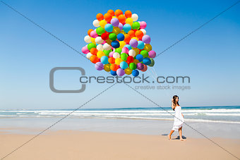 Beauty walking with ballons