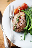Rustic steak with vegetables and herbs