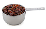 Raisins presented in an American metal cup measure