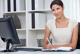 Hispanic Latina Woman or Businesswoman in Office 