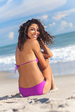 Sexy Woman Girl Sitting in Bikini on Beach