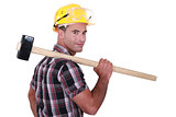 Builder with a sledgehammer