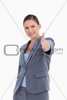 Smiling tradeswoman giving thumb up