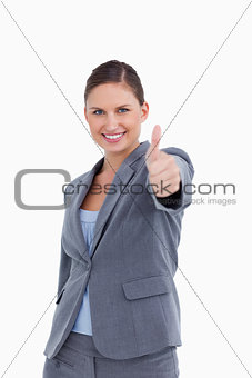 Smiling saleswoman giving her approval