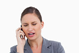 Close up of angry tradeswoman shouting at caller