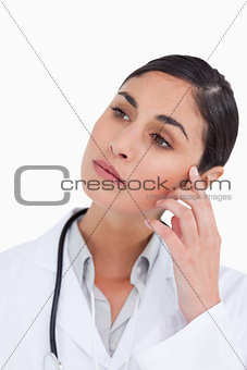 Close up of thoughtful female doctor