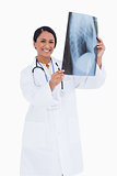 Smiling female physician with x-ray