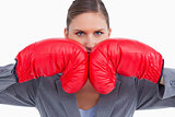 Aggressive tradeswoman with boxing gloves