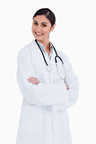 Smiling female doctor with her arms folded