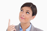 Close up of female entrepreneur pointing and looking up