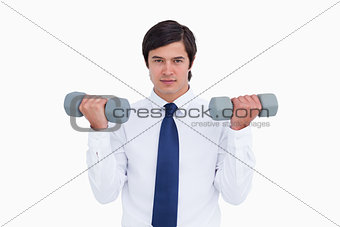 Tradesman lifting weights