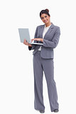 Smiling female entrepreneur with her laptop