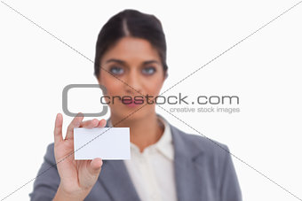 Female entrepreneur showing her business card