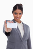 Blank business card being held by female entrepreneur