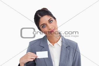 Female entrepreneur pointing at name sign