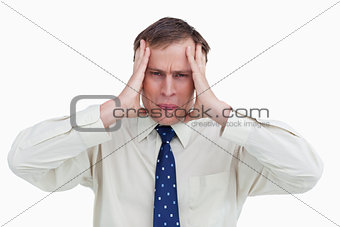 Close up of businessman experiencing a headache